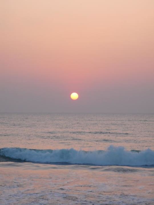 Sonnenuntergang vorm Hotel Royal Palms Beach Hotel