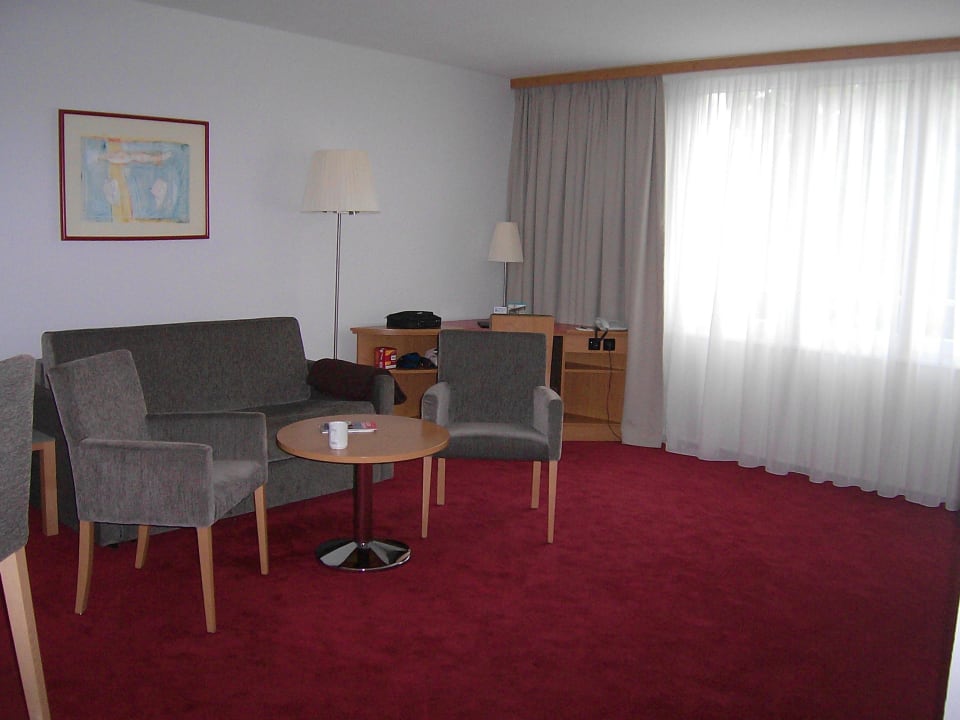 Gemütliche Sitzgruppe im Wohnraum NH Collection Hamburg City