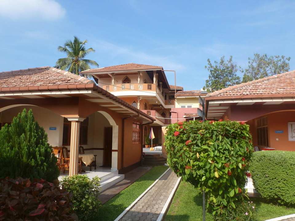 Einige Bungalows im Garten Paradise Holiday Village