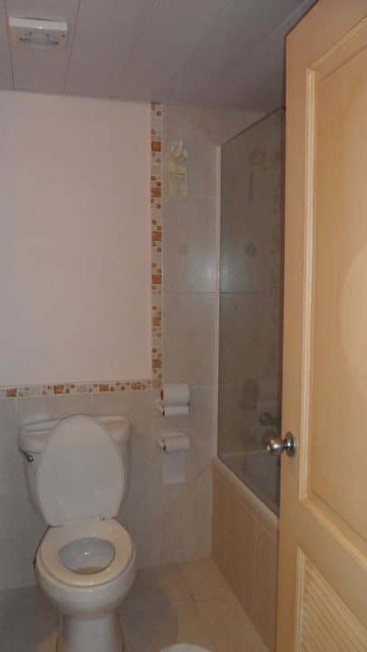 Toilette im Bad Wyndham Alltra Punta Cana