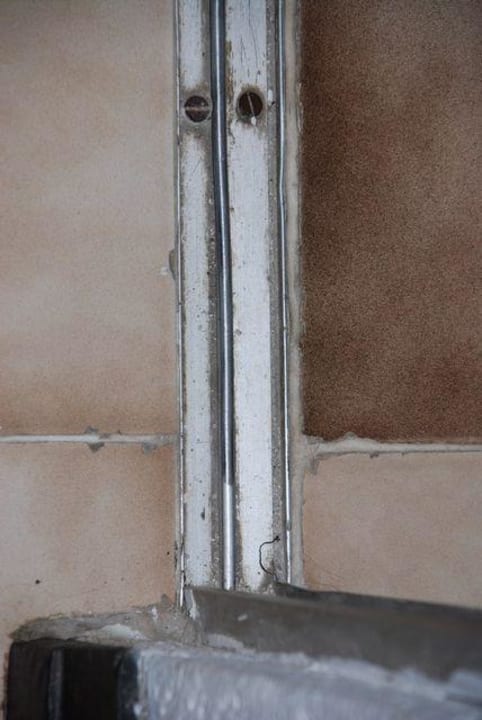 Scharfkantiger Übergang Travellers Beach Hotel & Club