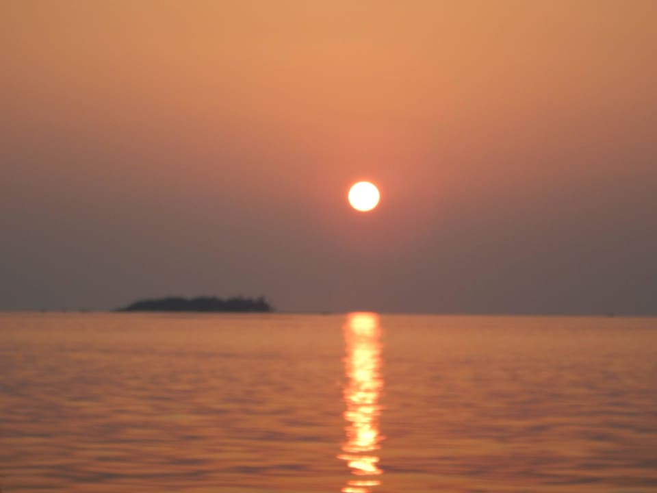 Sonnenuntergang bei Bootsausflug Meeru Maldives Resort Island