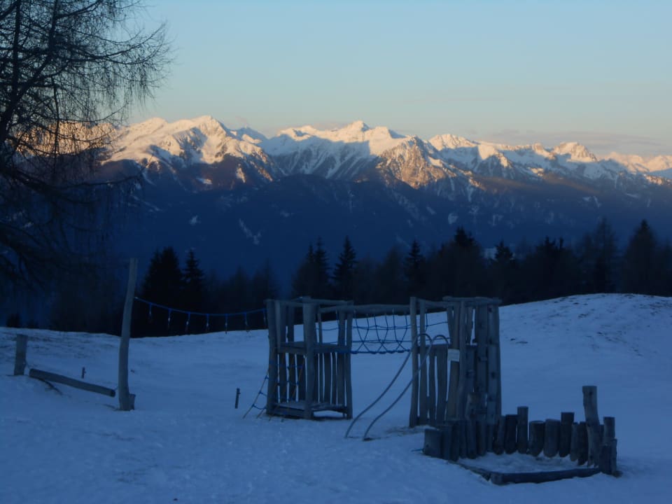 Tobel vor glühenden Alpen Kreuzwiesen Almhütte