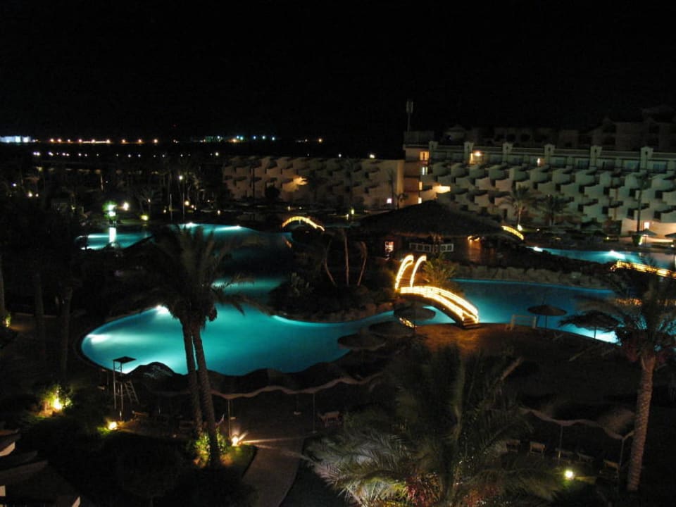 Pool by night Pyramisa Beach Resort Sahl Hasheesh