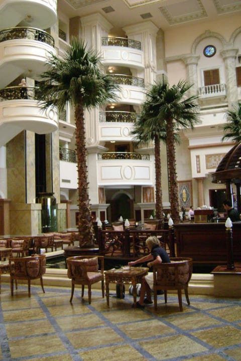 Hotelhalle mit Palmen  Palm Royale Resort - Soma Bay