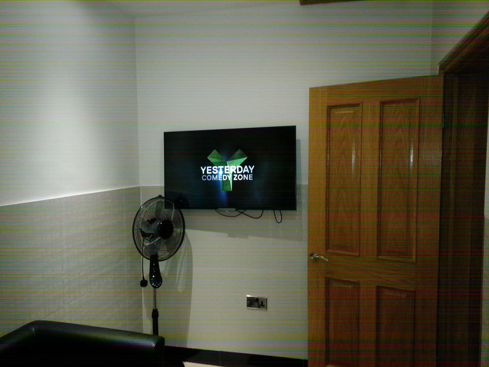 Pokój i tv Hyde Park Apartments