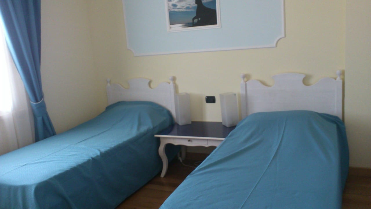 Schlafzimmer Residence Giardino Dei Colori