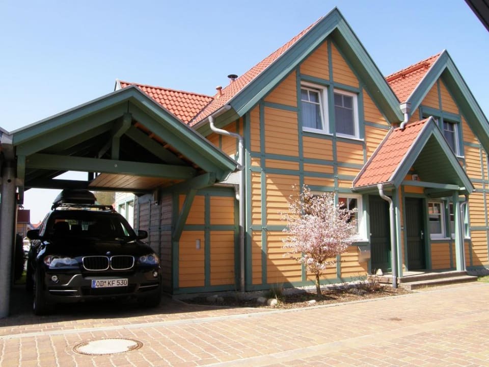 Eingang und Carport Ferienaus S24 Hafendorf Rheinsberg Ferienhaus Merker S24