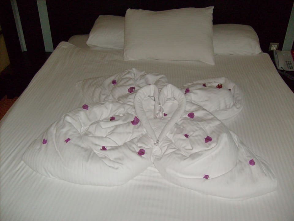 Mooi bed opgemaakt Limak Lara Deluxe Hotel & Resort