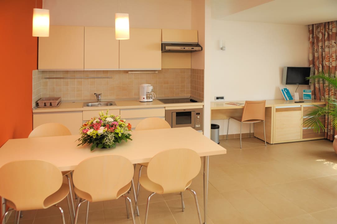 Kitchen and living room in one apartment Maistra Select Belvedere Resort