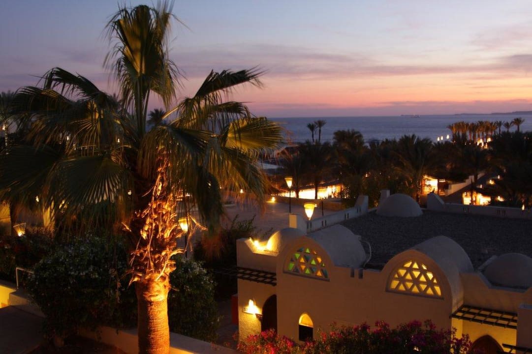 Blick aus dem Zimmer mit Sonnenuntergang Reef Oasis Beach Resort