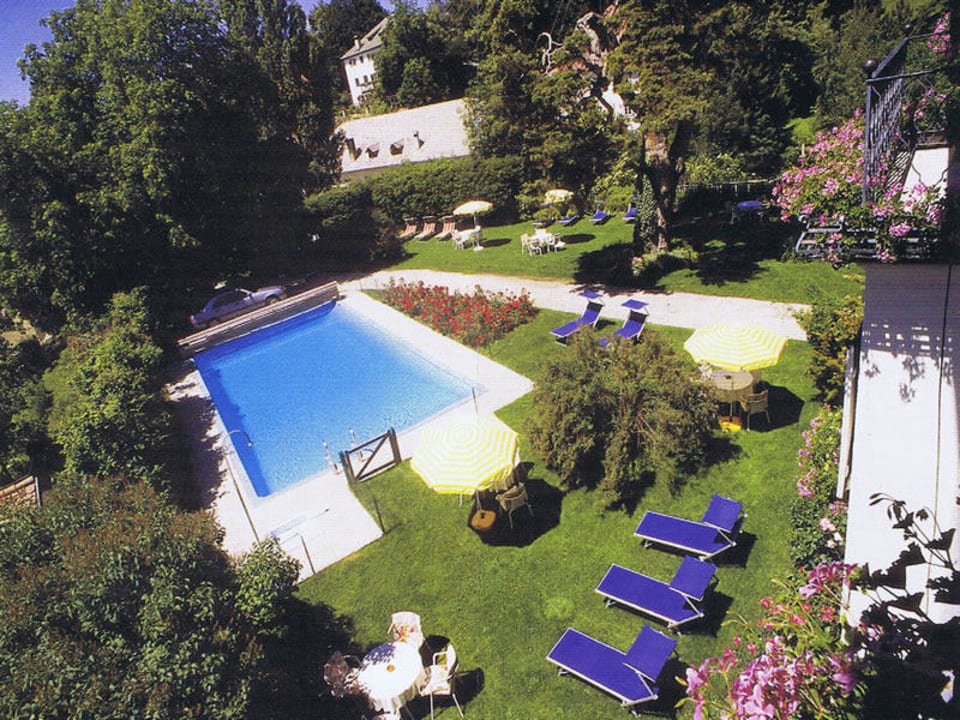 Der Garten mit Schwimmbad Piccolo Hotel