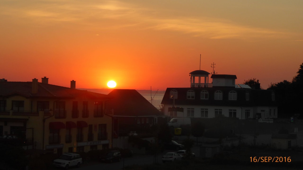 Sonnenaufgang über dem Hafen Apartmentanlage Urlaubsräume - Wohnung 3.14