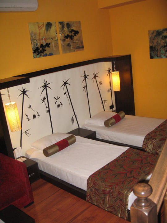 Betten in der ersten Etage des Zimmers Siam Elegance Hotels & Spa