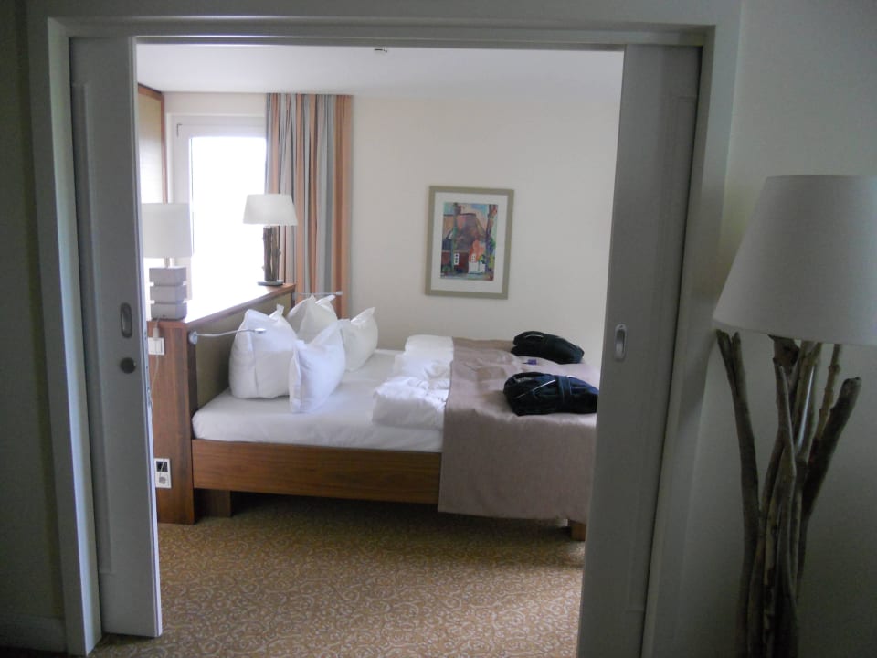 Blick ins Schlafzimmer vom Wohnzimmer aus Upstalsboom Kühlungsborn