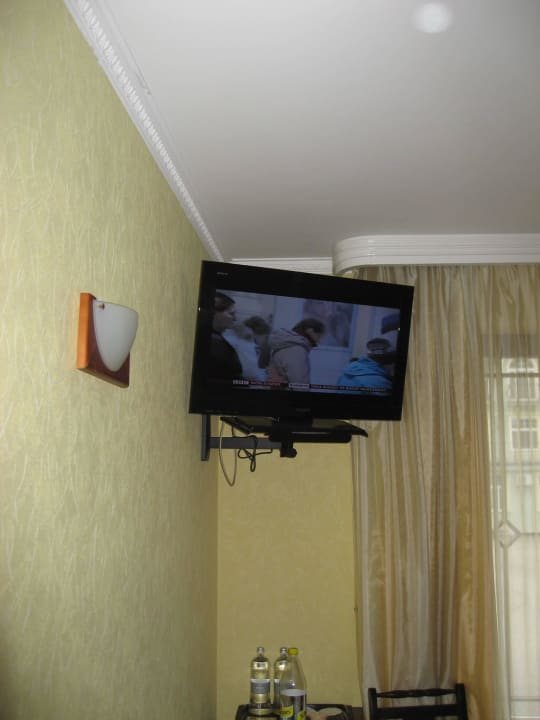 Tv and mini bar below Pegasa Pils Spa Hotel