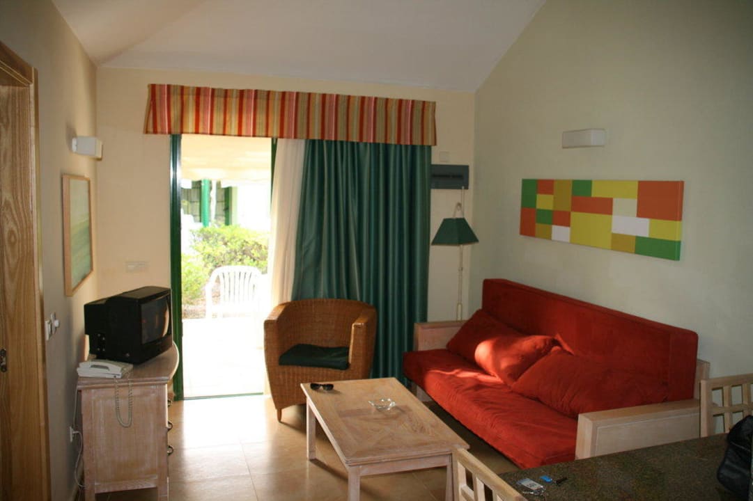 Wohnzimmer mit Blick nach draußen Bungalows Cordial Sandy Golf