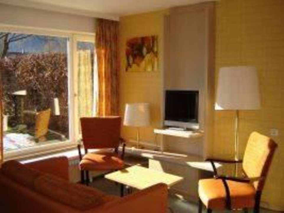 Wohnzimmer 6 & 8 Personen Haus Chiemgau Resort Siegsdorf