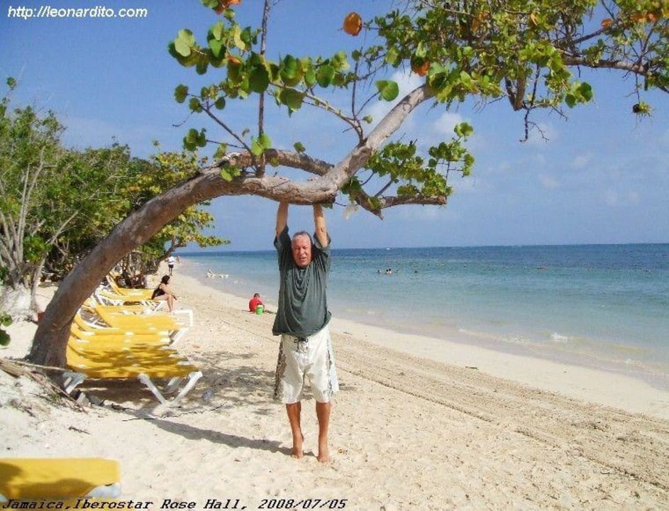 Stretching on the beach Iberostar Waves Rose Hall Beach
