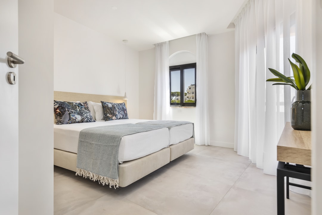 Zimmer Clube Maria Luisa