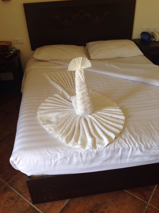 Doppelbett im Familienzimmer Three Corners Sea Beach Resort