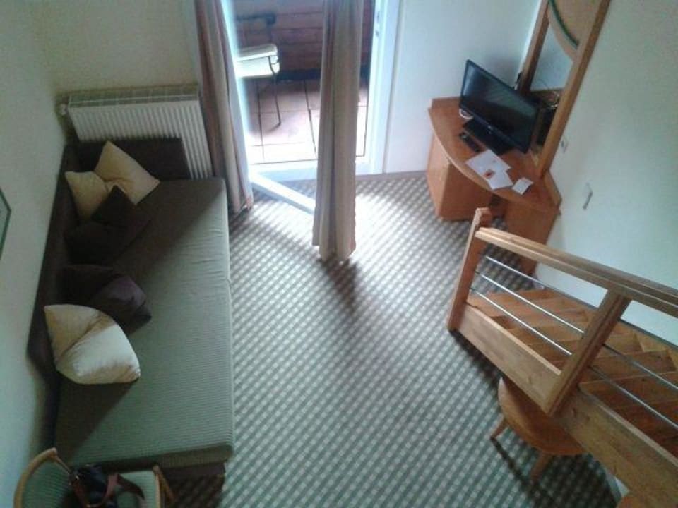 Blick in den Wohnbereich von der Gaube aus Aldiana Club Schlanitzen Alm