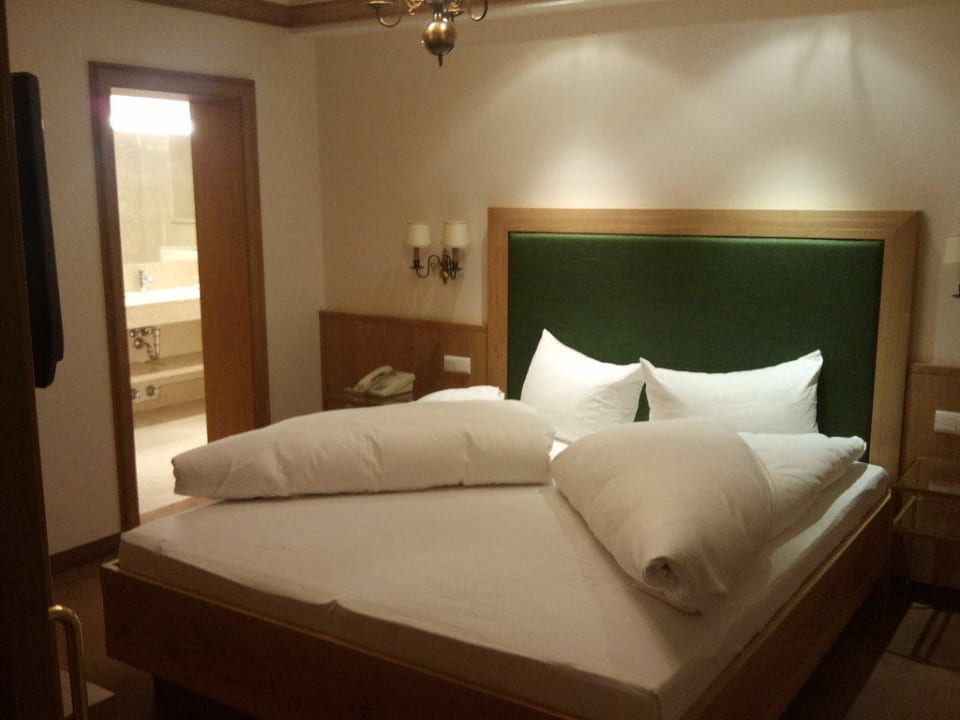 Das Schlafzimmer Neuhaus Zillertal Resort