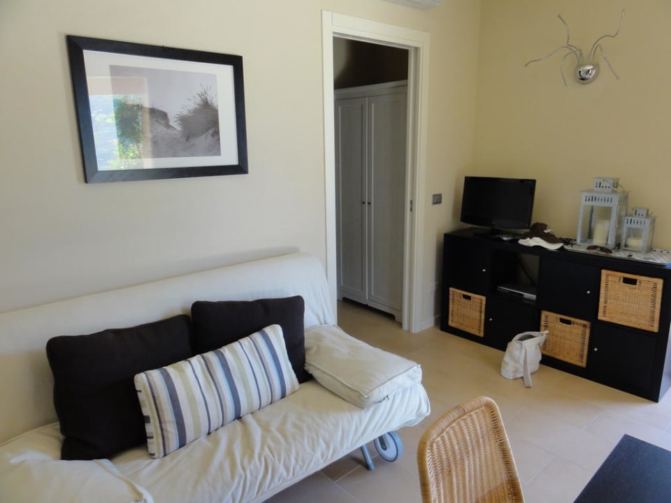 Wohnbereich mit Fernseher Hotel Residence Relais Cà dell'Era