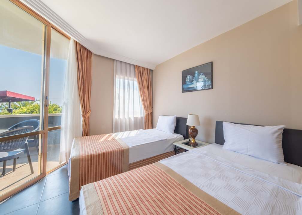 Zimmer Senza Sunset Beach Hotel