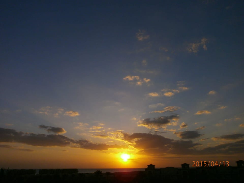 Sonnenaufgang mit Wolken Pensée Royal Garden Beach Resort