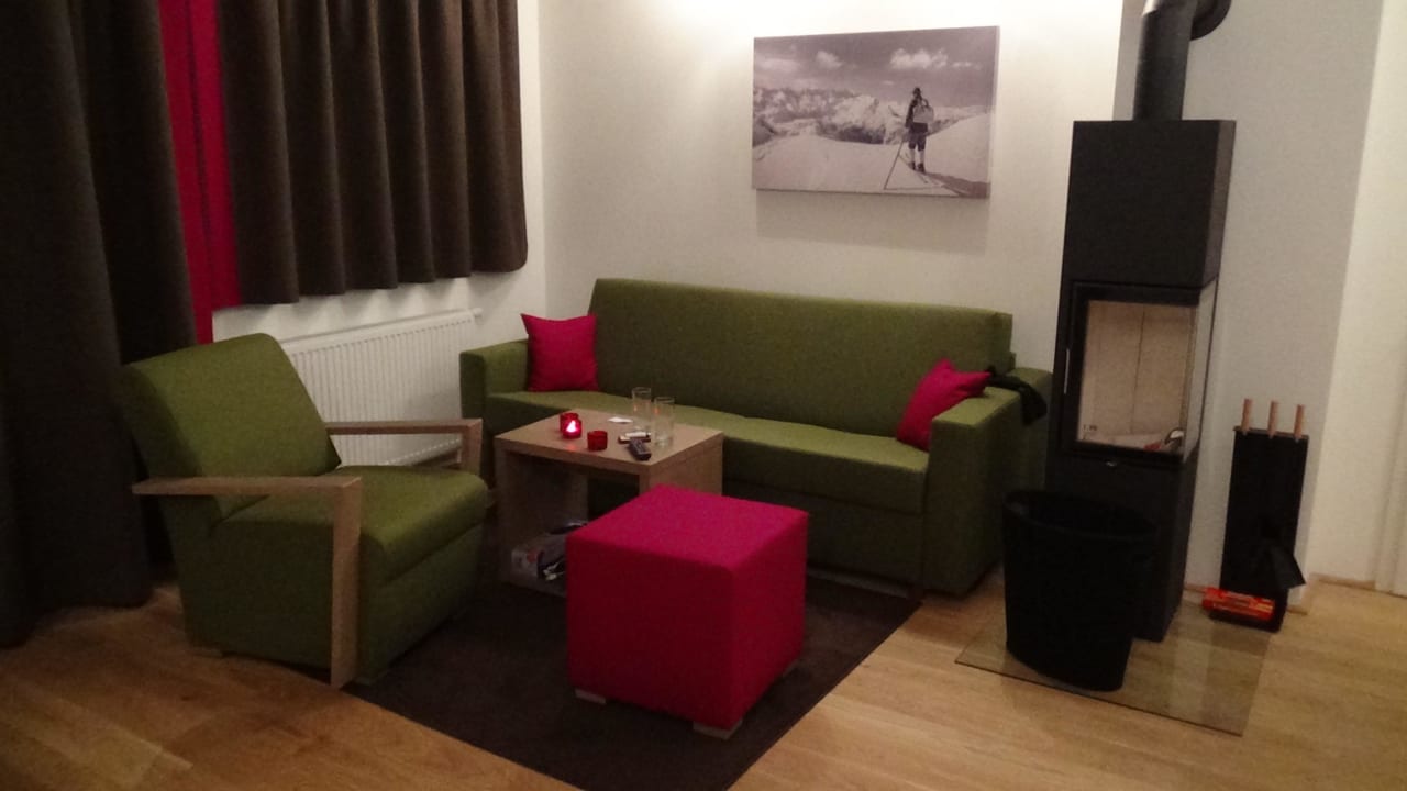 Wohnlandschaft mit Schwedenofen Almresort Gartnerkofel