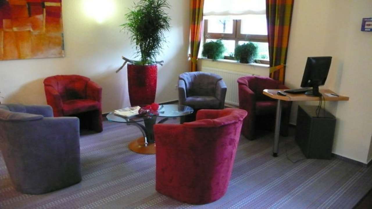 Sitzecke und Computerplatz Hotel Hollmann