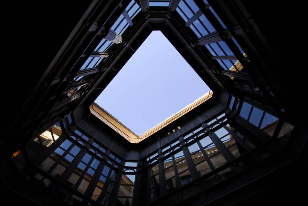 Der Innenhof und Übergang zum Restaurant Sant Francesc Hotel Singular