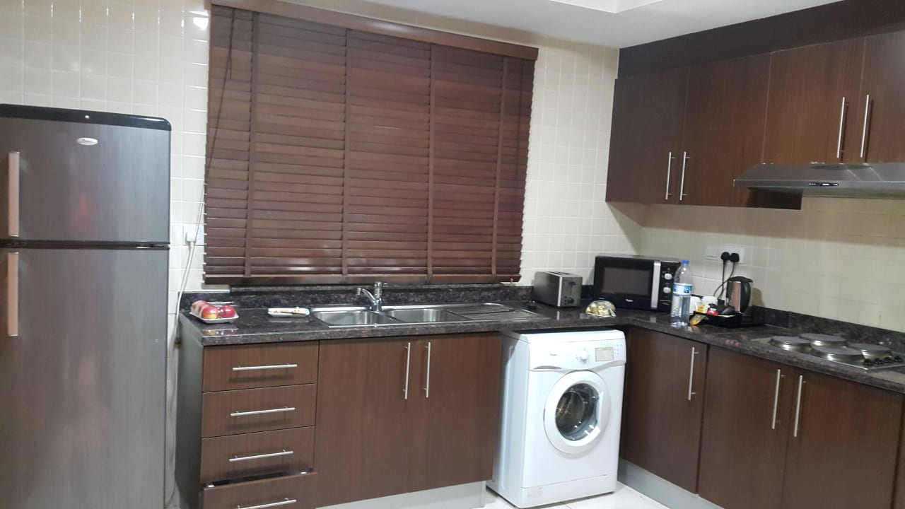 Kitchen Abidos Aparthotel Dubailand