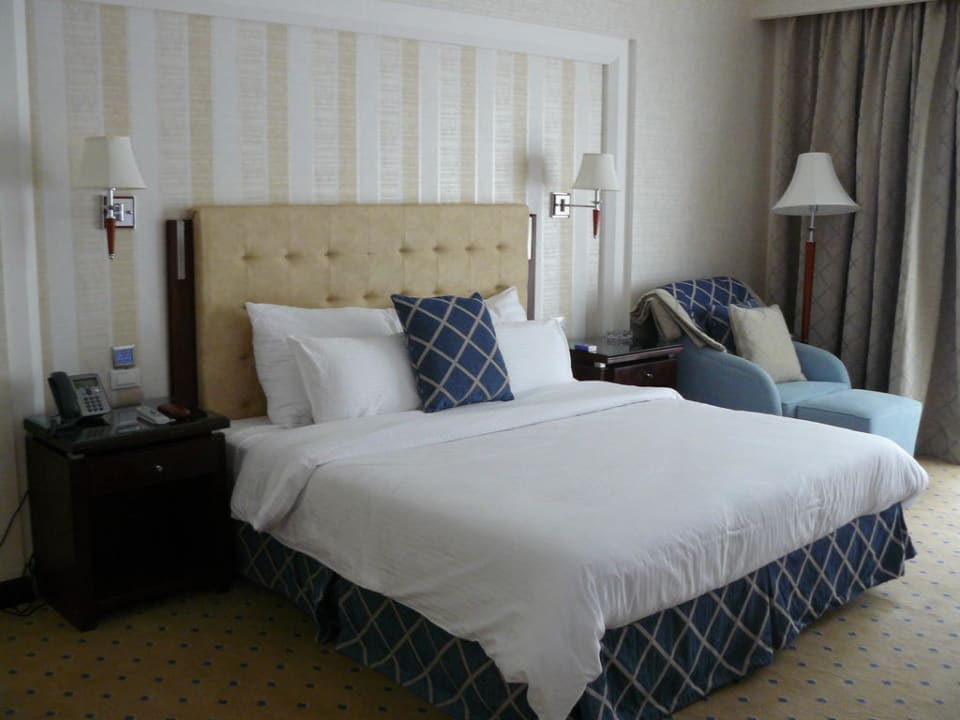 Bett im Standardzimmer Premier Le Reve Hotel & Spa