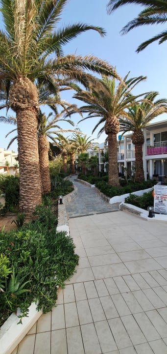 Gartenanlage HARPIN Happy Days Beach Hotel