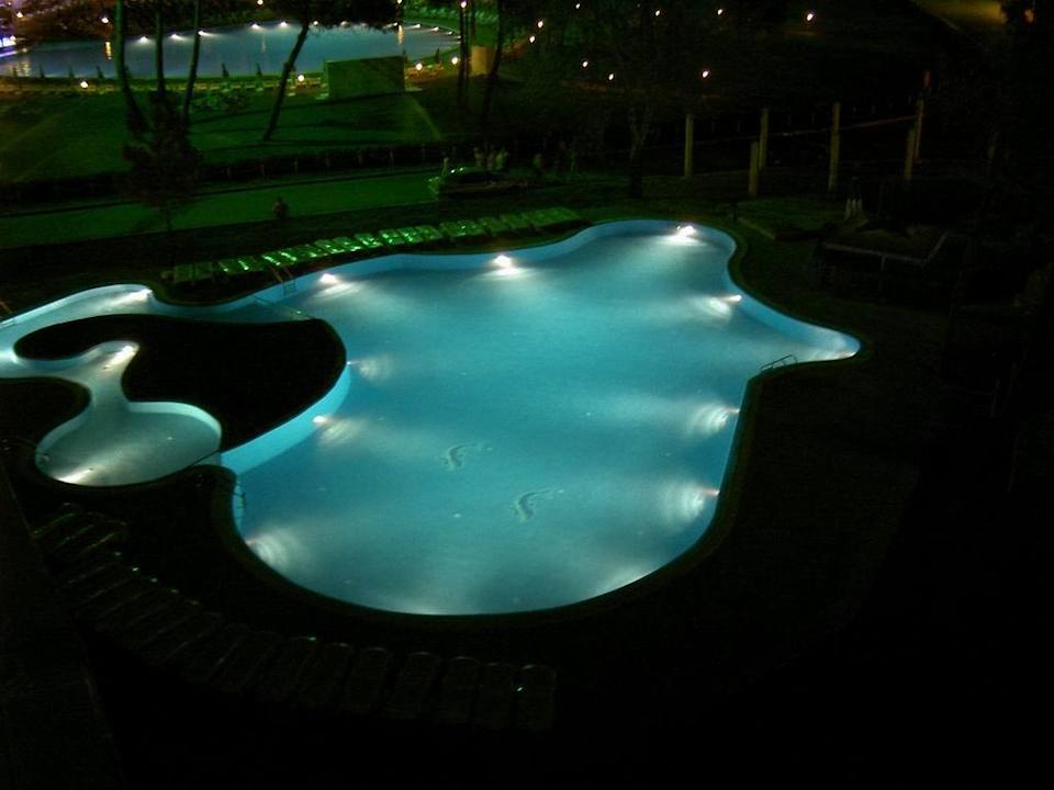Pool des Hotel Colosseum bei Nacht Hotel Colosseum