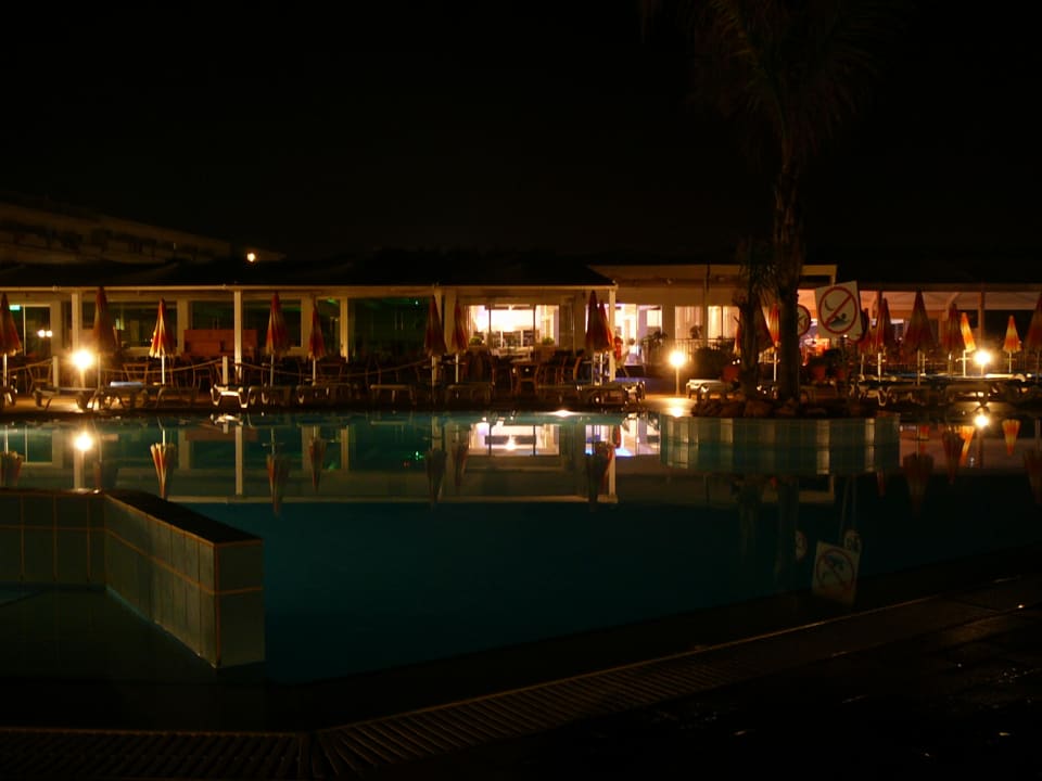 Pool by night Asterias Beach