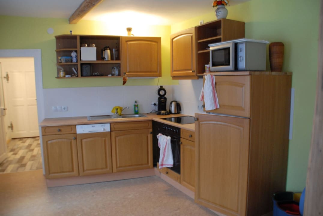 Kochen in der Wohnküche Ferienwohnung Schrör