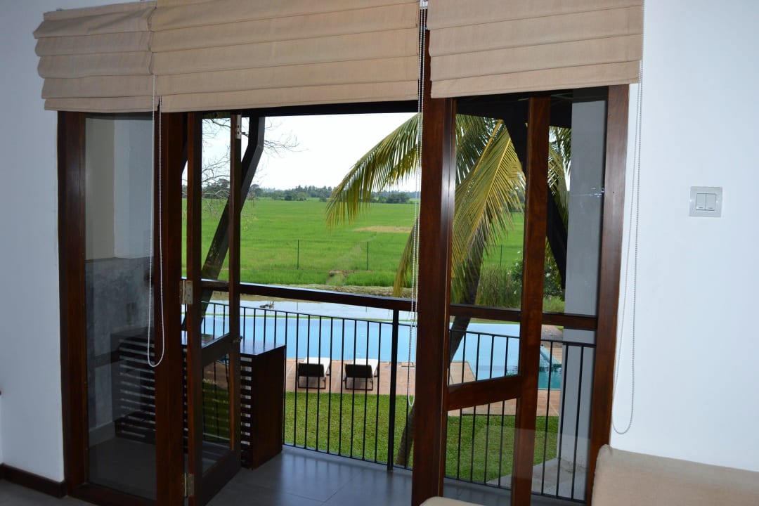 Blick vom Balkon auf den Pool Kithala Resort