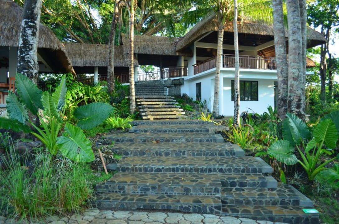 Stairway to garden and pool Amun Ini Beach Resort & Spa