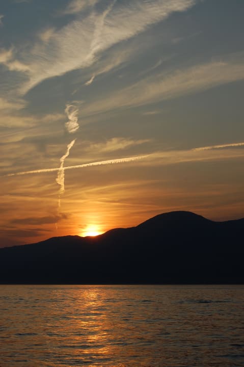 Sonnenuntergang am See Hotel Al Castello