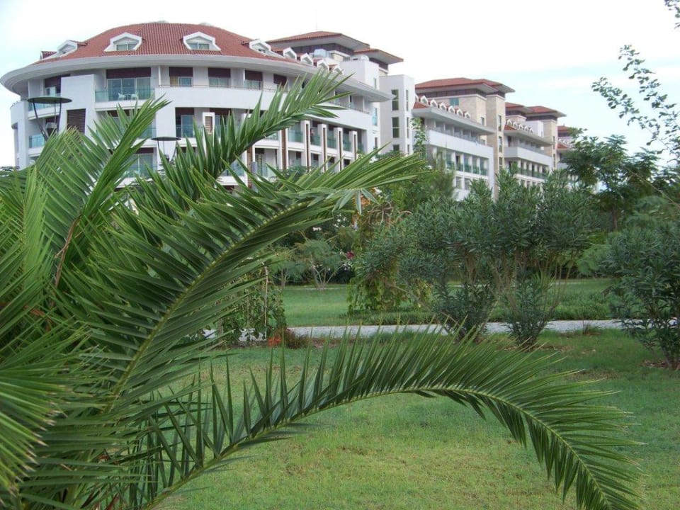 Blick von der Strandpromenade zum Evren Beach Sunis Evren Beach Resort Hotel & Spa