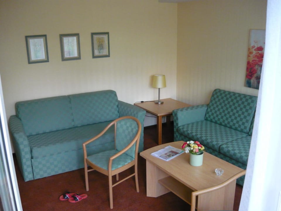 Wohnraum mit Bettcouch Ferienwohnungen Ferienpark Weissenhäuser Strand