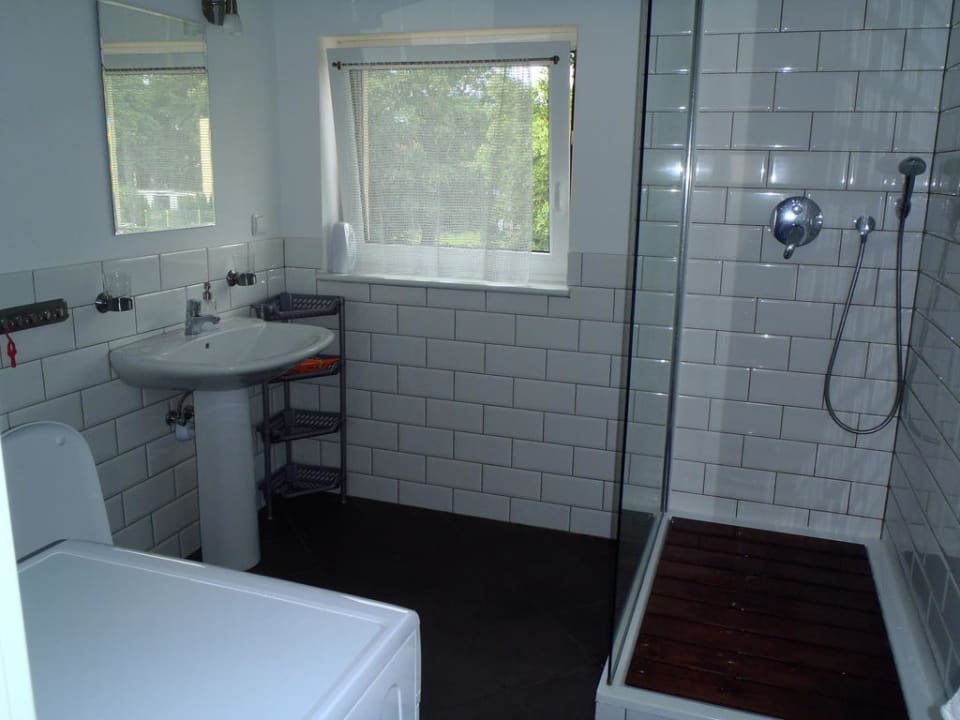 Łazienka z pralką Apartament Komandorski