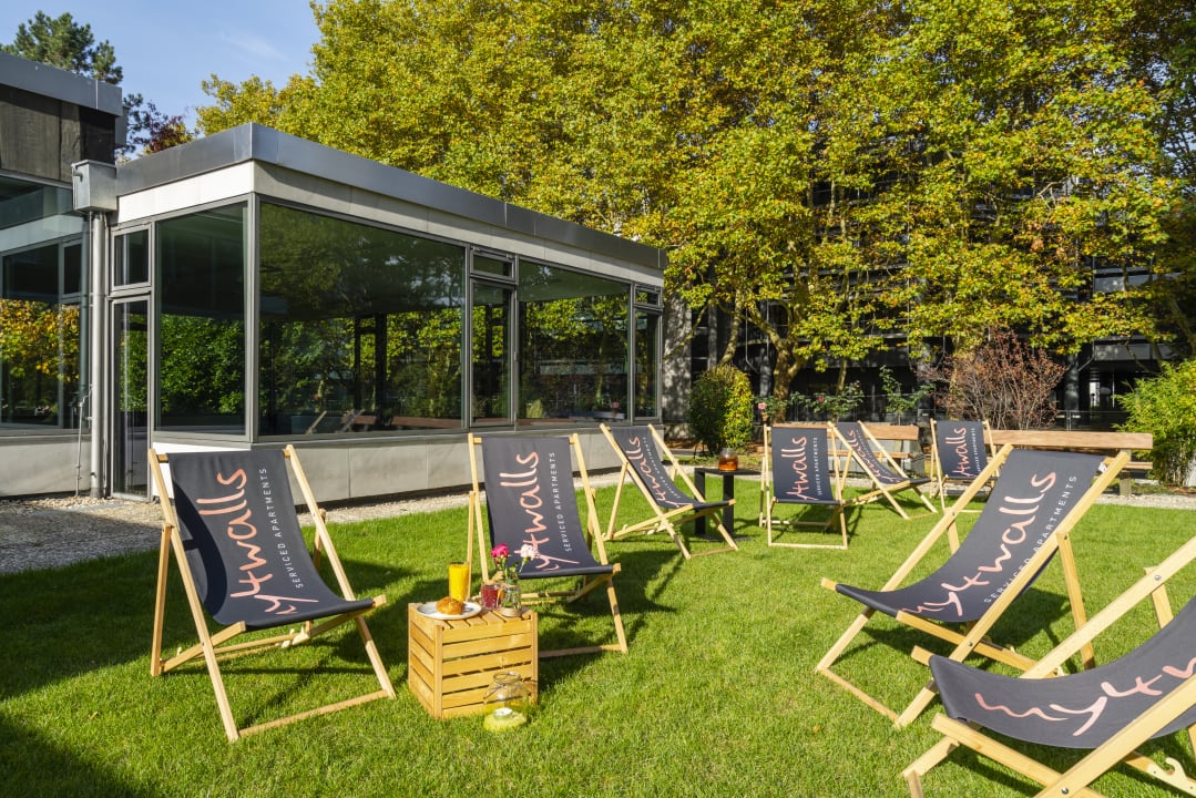 Gartenanlage my4walls Serviced Apartments