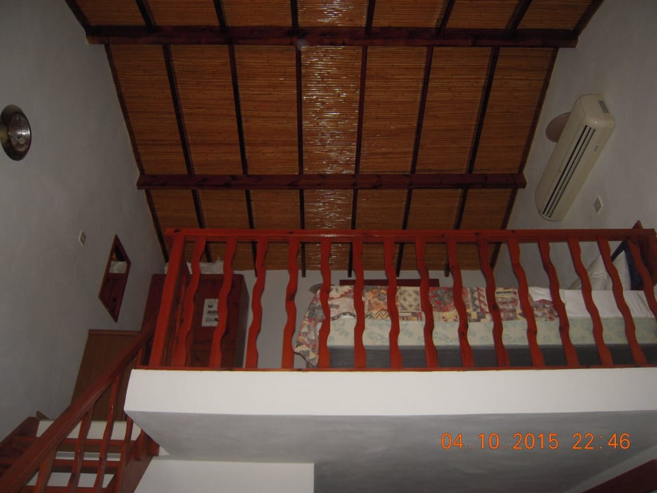 Спальная в бунгало Bungalows Five Fingers