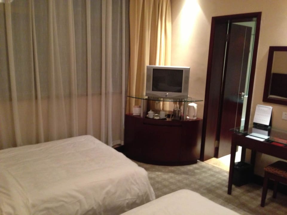 Bedroom with the bathroom entrance Hotel Dunhuang