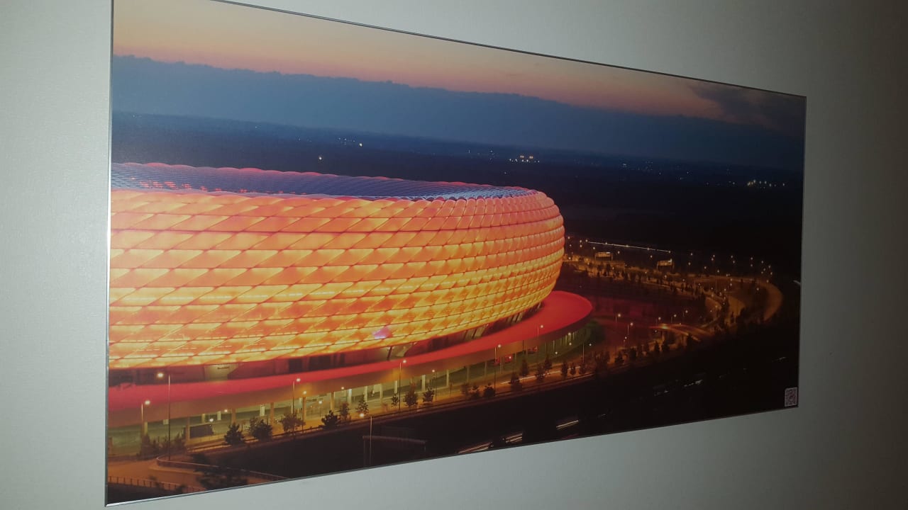 Bild auf dem Hotelflur H4 Hotel München Messe