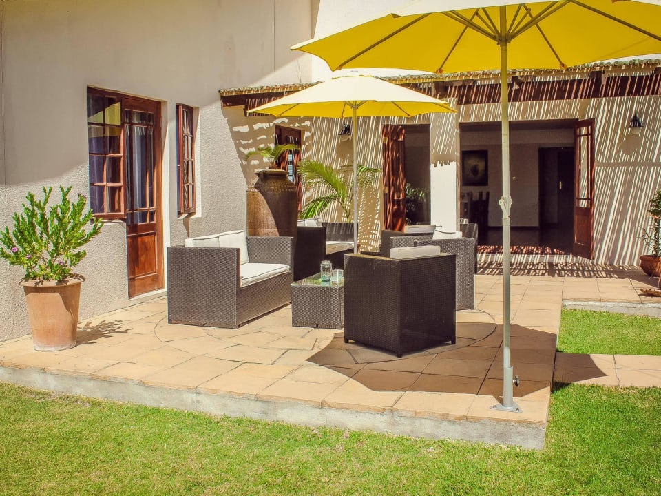 Garden and pool  AmaKhosi Guesthouse